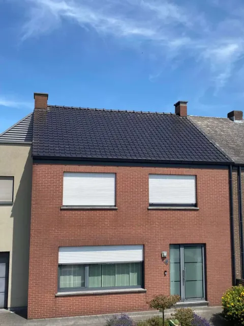 Dakrenovatie van een woning in Arendonk met nieuwe dakpannen